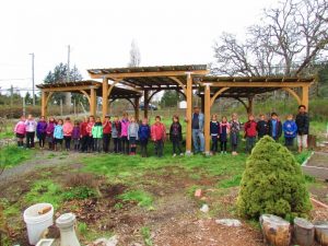 Westmont Montessori kids lined up at Learning Garden Shelter